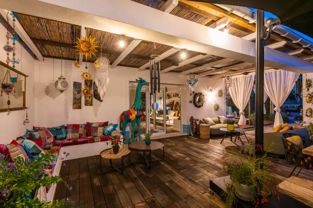 Bohemian style outdoor lounge and patio area at Seeds of Silence boutique hotel.